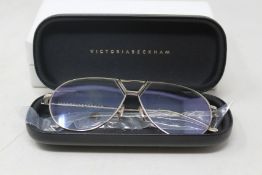 A pair of as new Victoria Beckham glasses frames.