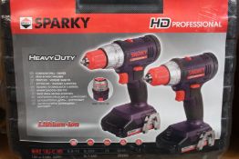 Three boxes of as new Sparky professional heavy duty drill sets.