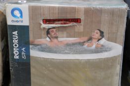 A boxed as new Avenli Rotorua four person hot tub spa.
