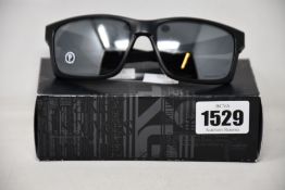 A pair of as new Oakley Mainlink sunglasses.