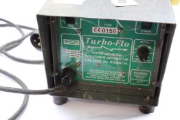 A pre-owned Turbo-Flo Fresh Air Hose Breathing Apparatus.