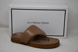 A pair of as new Gia x Pernille Teisbaek padded leather thong sandals in nude brown (EU 41 - RRP £