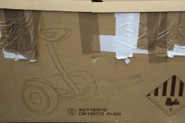 A pre-owned Ninebot Segway.