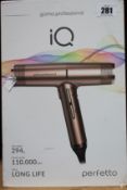 A Gama Profesional iQ Perfetto Hairdryer (UK adaptor required).