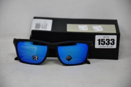 A pair of as new Oakley Sylas sunglasses.