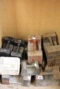 Twelve pre-owned weight blocks (Various sizes).
