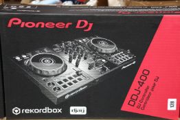 A boxed as new Pioneer DDJ-400 DJ controller.