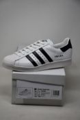 A pair of as new Adidas Prada Superstar sneakers (UK 8).