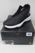 A pair of as new Nike Jordan B Fly (UK 8.5).