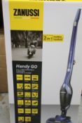 Six as new Zanussi Handy Go 2 in 1 handy rechargeable vacuums (4x red and 2x blue).