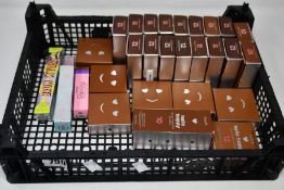 Twenty eight Benefit toiletries to include soft blur foundation (Assorted shades), velvet powder