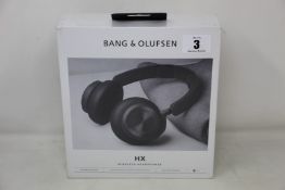 A pair of boxed as new Bang & Olufsen HX Wireless Headphones.