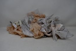 Twenty pairs of as new Love Stories Lolita Lace briefs in sand (Sizes 1, 2, 3, 4 - RRP £27 each).