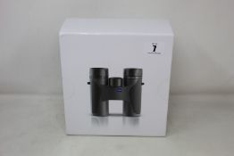 A pair of boxed as new Zeiss Terra ED 10x32 binoculars (Green).
