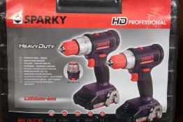 Three boxes of as new Sparky professional heavy duty drill sets.