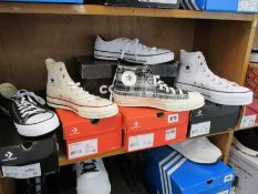 Five pairs of assorted as new Converse sneakers.