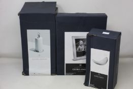 A boxed as new Georg Jensen Legacy picture frame, a boxed as new Georg Jensen Bernadotte