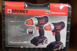 Three boxes of as new Sparky professional heavy duty drill sets.