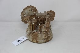Paul Gandy (England b.1930), studio pottery sculpture depicting a town, circa 1980, decorated with