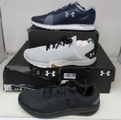 Three pairs of as new Under Armour footwear; Charged Pursuit 2 (UK 10), Tribase Reign 3 (UK 9.5) and