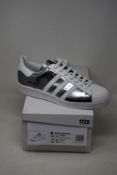 A pair of as new Adidas Prada Superstar sneakers (UK 10).