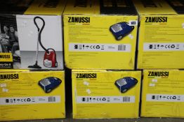Nine new Zanussi Easy Go ll 3L, 700W, 7.5M radius retractable cord vacuum cleaner2 (3 x red, 6 x