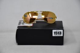 A pair of as new Oakley Feedback sunglasses.