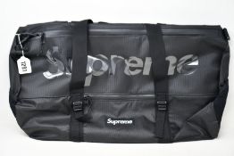 An as new Supreme duffle bag.