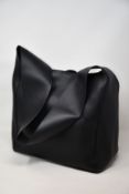 An as new Joseph Cozumel slouch bag in black (RRP £297).