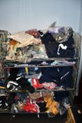 A quantity of assorted as new clothing and related items.