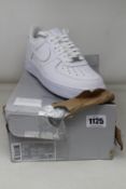A pair of as new Nike Air Force 1 '07 (UK 7).