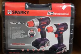 Three boxes of as new Sparky professional heavy duty drill sets.