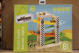 Eight boxed as new The Wooden Toy Factory click clack racing tracks.
