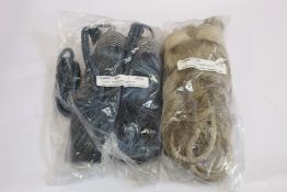Approximately forty unbranded curtain ties in a variety of colours.