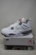 A pair of as new Nike Air Jordan 4 Retro (UK 9).