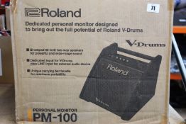 A boxed as new Roland PM-100 personal drum monitor.
