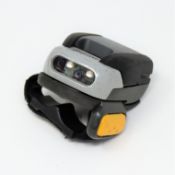 A pre-owned Symbol RS507 Bluetooth Ring Barcode Scanner (P/N: RS507-IM200000TWR) with battery.