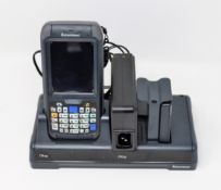A pre-owned Intermec CN70 Barcode Scanner (M/N: 1000CP01U) with Intermec 852-920-001 Charging