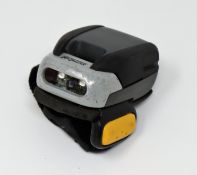 A pre-owned Symbol RS507 Bluetooth Ring Barcode Scanner (P/N: RS507-IM200000TWR) with battery.