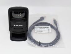 A pre-owned Motorola DS9208 Barcode Scanner with as new cable.