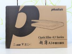 A boxed as new Plustek OpticSlim 1180 A3 large format flat bed scanner in silver/white.