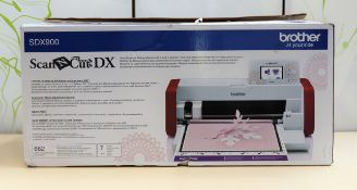 A pre-owned Brother ScanNCut SDX900 Cutting Plotter (Boxed. UK power cable included. Untested,