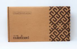 A boxed as new MikroTik CRS312-4C+8XG-RM 8-Port Layer 3 Managed Rackmount 10-Gigabit Switch (Box