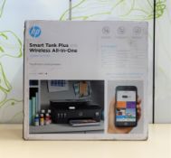 A boxed as new HP Smart Tank Plus 570 Wireless All-in-One Printer (Box sealed, some damage to box).