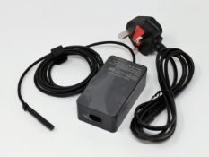 COLLECTION ONLY: A quantity of boxed as new unbranded 65W power supplies for Microsoft Surface