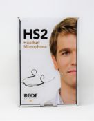 A boxed as new Rode HS2B Lightweight Headset Microphone in Pink (Size Small) (Box opened).