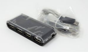 COLLECTION ONLY: A large quantity of boxed as new unbranded 4-port USB Hubs (Some damage to boxes).