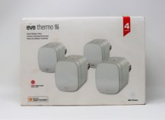 Four boxed as new Eve Thermo Smart Radiator Valves (Outer box opened, individual boxes sealed).