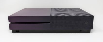 A pre-owned Xbox One S 1TB fortnight edition games console (model 1681) in purple (console unit