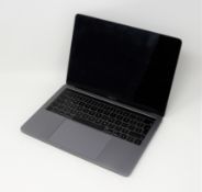 SOLD FOR PARTS: A pre-owned MacBook Pro 13